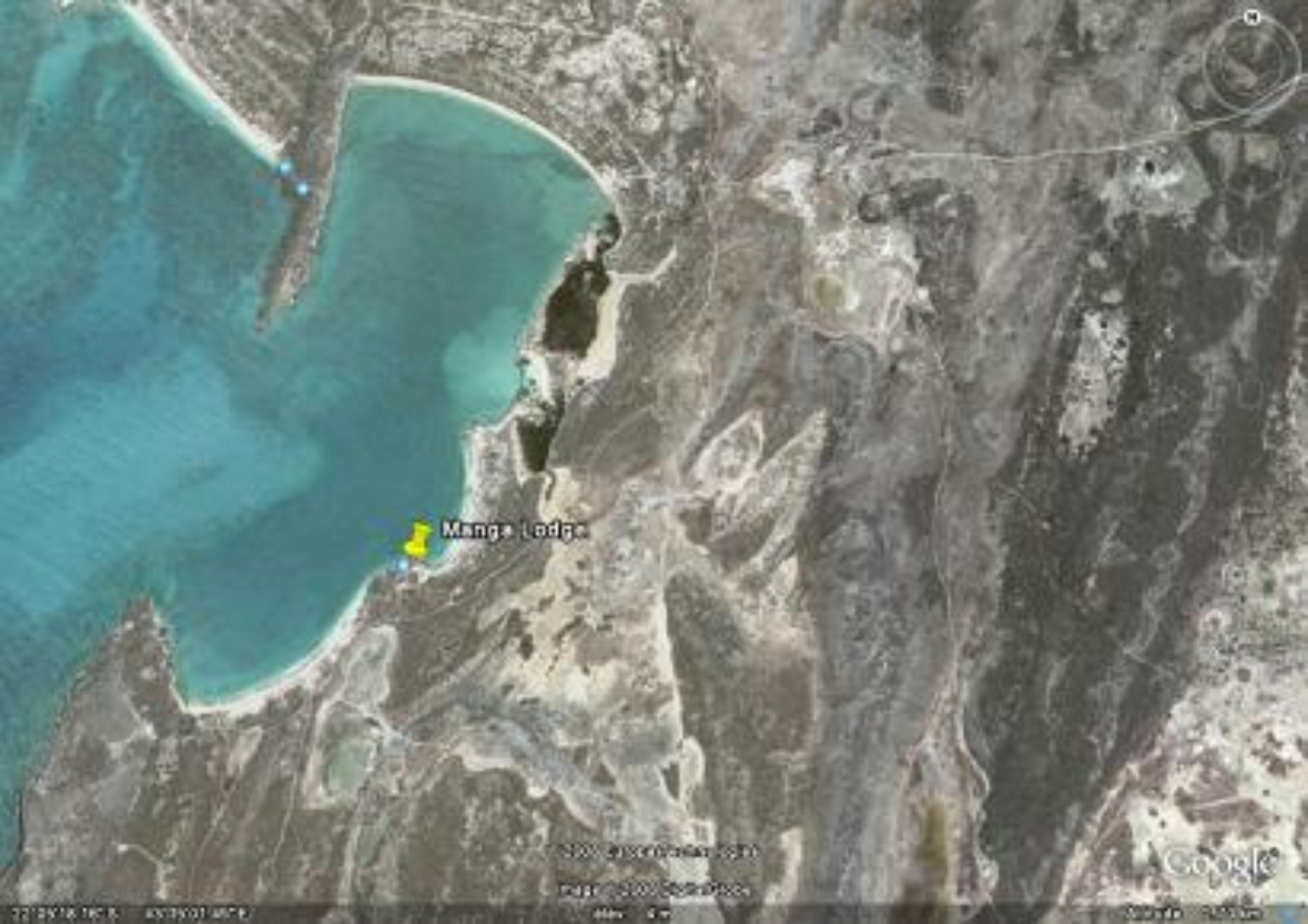 Vue satellite rapprochée de MangaLodge et de sa baie